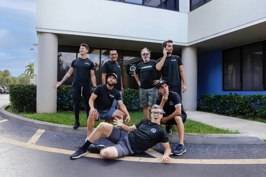 cycle limited store employees posing together